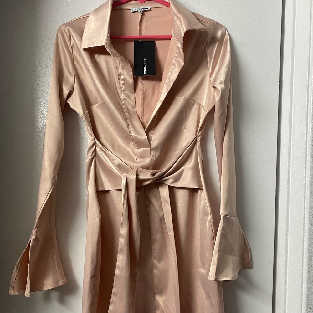Pink satin Lycra mini dress. Size Small. Belled cuffs, belted.